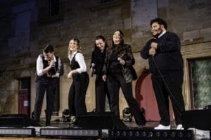 The Just Vox group on stage.